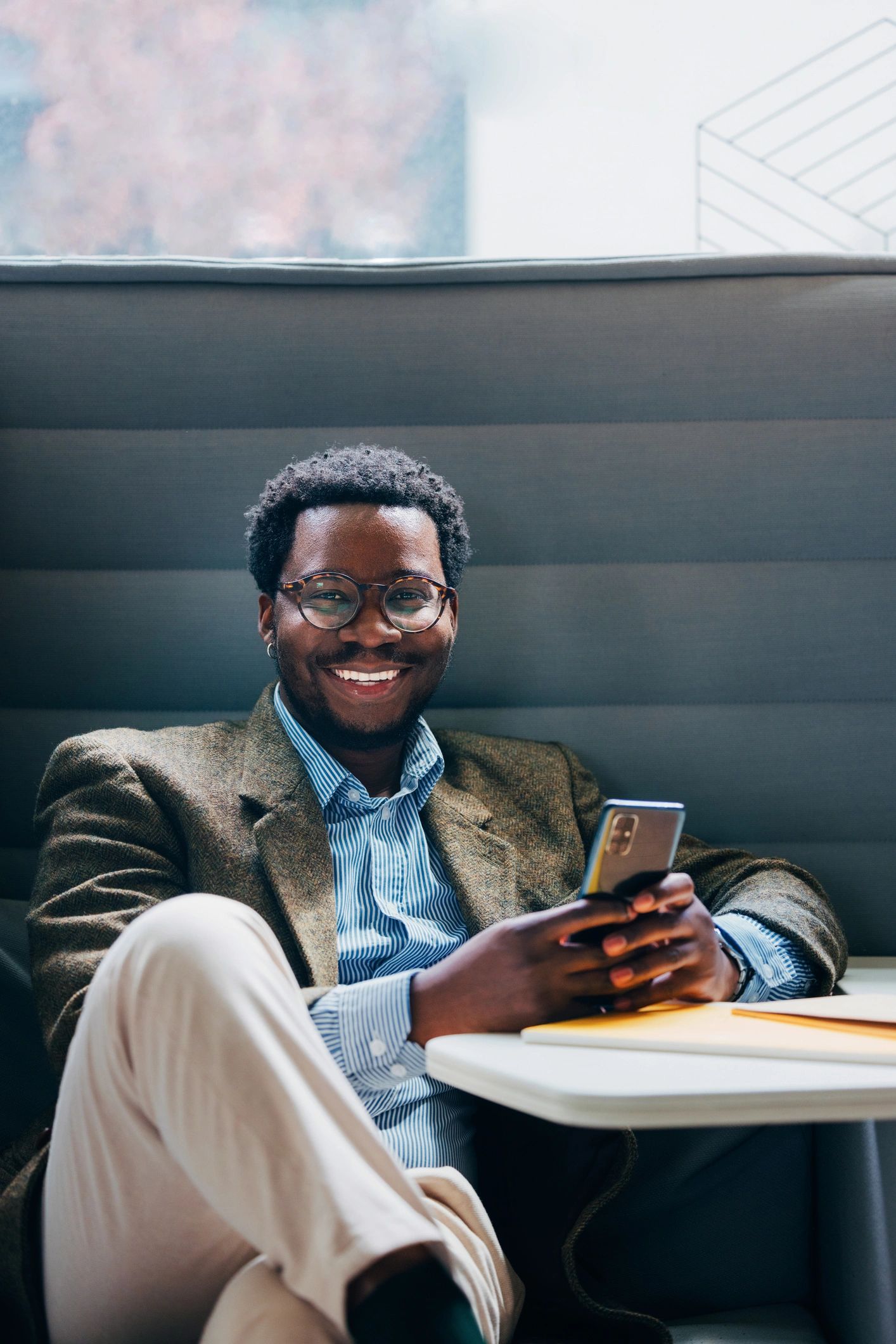 Professional smiling in a modern office